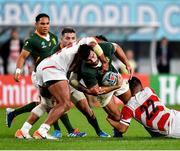 20 October 2019; Damian de Allende of South Africa is tackled by Amanaki Lelei Mafi, left, and Rikiya Matsuda of Japan during the 2019 Rugby World Cup Quarter-Final match between Japan and South Africa at the Tokyo Stadium in Chofu, Japan. Photo by Brendan Moran/Sportsfile