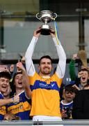 20 October 2019; Conor Clancy of St. Rynagh's lifts the trophy following the Offaly County Senior Club Hurling Championship Final match between Birr and St Rynaghs at O'Connor Park in Tullamore, Offaly. Photo by Harry Murphy/Sportsfile