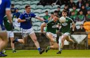 20 October 2019;  Neil McGee of Gaoth Dobhair scoring a point despite the attentions of Ciaran Thompson of Naomh Conaill during the Donegal County Senior Club Football Championship Final match between Gaoth Dobhair and Naomh Conaill at Mac Cumhaill Park in Ballybofey, Donegal. Photo by Oliver McVeigh/Sportsfile