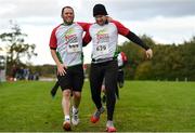 20 October 2019; Joao Luna, left, and Dean Higgins cross the finish line during the SPAR Cross Country Xperience at the National Sports Campus Abbotstown in Dublin. Photo by Sam Barnes/Sportsfile