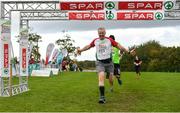 20 October 2019; Peter O'Brien Gleeson celebrates as he crosses the finish line during the SPAR Cross Country Xperience at the National Sports Campus Abbotstown in Dublin. Photo by Sam Barnes/Sportsfile