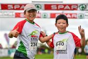 20 October 2019; Yingjun Li, left, and Meiyan Jin after running during the SPAR Cross Country Xperience at the National Sports Campus Abbotstown in Dublin. Photo by Sam Barnes/Sportsfile