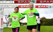 20 October 2019; Willie O'Byrne, Managing Director of BWG Foods, celebrates finishing with his daughter Michelle O'Byrne following the SPAR Cross Country Xperience at the National Sports Campus Abbotstown in Dublin. Photo by Sam Barnes/Sportsfile