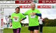 20 October 2019; Willie O'Byrne, Managing Director of BWG Foods, celebrates finishing with his daughter Michelle O'Byrne following the SPAR Cross Country Xperience at the National Sports Campus Abbotstown in Dublin. Photo by Sam Barnes/Sportsfile