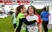 20 October 2019; Greta Hoey, left, and Kim Wilkinson-Daly embrace one another after finishing the SPAR Cross Country Xperience at the National Sports Campus Abbotstown in Dublin. Photo by Sam Barnes/Sportsfile