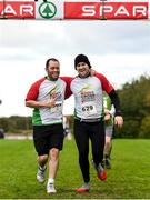 20 October 2019; Joao Luna, left, and Dean Higgins cross the finish line during the SPAR Cross Country Xperience at the National Sports Campus Abbotstown in Dublin. Photo by Sam Barnes/Sportsfile