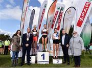 20 October 2019; In attendance at the medal presentation for the Junior Women's 4500m XC event are, from left, Emer O'Gorman, Director of Services, Fingal County Council, Cllr Eoghan O'Brien, Mayor of Fingal,  Jodie McCann of Dublin City Harriers, Co. Dublin, silver, Grace Carson of Northern Ireland, gold, Danielle Donegan of Tullamore Harriers AC, Co. Offaly, bronze, Colin Donnelly, Spar Sales Director and Georgina Drumm, President, Athletics Ireland, during the SPAR Autumn Open International Cross Country Festival at the National Sports Campus Abbotstown in Dublin. Photo by Sam Barnes/Sportsfile