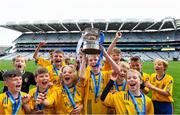 22 October 2019; Gaelscoil Bhrian Boroimhe Swords captain Odhran O'Conaill lifts the cup as his team-mates celebrate following the match between Gaelscoil Bhrian Boroimhe Swords and St Brigid's BNS Killester during day one of the Allianz Cumann na mBunscol finals at Croke Park in Dublin. Photo by Matt Browne/Sportsfile