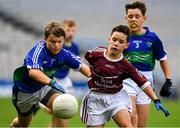 22 October 2019; Ethan Ryan of St Oliver Plunkett NS Malahide in action against Darragh Murphy of Scoil Maelruain SNS Old Bawn Tallaght in the match between Scoil Maelruain SNS Old Bawn Tallaght and St Oliver Plunkett NS Malahide during day one of the Allianz Cumann na mBunscol finals at Croke Park in Dublin. Photo by Matt Browne/Sportsfile