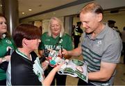 22 October 2019; Head coach Joe Schmidt is greeted by supporters on the Ireland Rugby Team's return at Dublin Airport from the Rugby World Cup. Photo by David Fitzgerald/Sportsfile