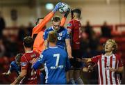 22 October 2019; Brendan Clarke of St Patrick's Athletic catches the ball ahead of Eoin Toal of Derry City during the SSE Airtricity League Premier Division match between Derry City and St Patrick's Athletic at Ryan McBride Brandywell Stadium in Derry. Photo by Oliver McVeigh/Sportsfile