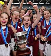 23 October 2019; Hannah Galvin of Presentation PS, Terenure, centre, and her team-mates celebrate after beating Mount Anville PS, Kilmacud, in the Corn Comhar Linn Cup Final during day two of the Allianz Cumann na mBunscol Finals at Croke Park in Dublin. Photo by Piaras Ó Mídheach/Sportsfile