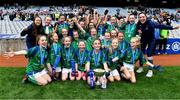 23 October 2019; Dublin ladies footballers Kate Fitzgibbon, left, and Sinéad Goldrick with the St Kevin's GNS, Kilnamanagh, players as they celebrate after beating Gaelscoil Eiscir Riara, Leamhcán, in the Corn na Laoch Cup Final during day two of the Allianz Cumann na mBunscol Finals at Croke Park in Dublin. Photo by Piaras Ó Mídheach/Sportsfile