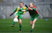 23 October 2019; Isabelle Johns of Our Lady Queen of the Apostles NS, Clonburris, in action against Hannah McCormack of St Raphaela's PS, Stillorgan, in the Corn na Chladaigh Shield Final during day two of the Allianz Cumann na mBunscol Finals at Croke Park in Dublin. Photo by Piaras Ó Mídheach/Sportsfile