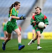 23 October 2019; Sadhbh McCann of St Raphaela's PS, Stillorgan, in action against Áoife McDermott of Our Lady Queen of the Apostles NS, Clonburris, in the Corn na Chladaigh Shield Final during day two of the Allianz Cumann na mBunscol Finals at Croke Park in Dublin. Photo by Piaras Ó Mídheach/Sportsfile