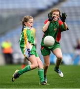 23 October 2019; Isabelle Johns of Our Lady Queen of the Apostles NS, Clonburris, in action against Sorcha Hayes of St Raphaela's PS, Stillorgan, in the Corn na Chladaigh Shield Final during day two of the Allianz Cumann na mBunscol Finals at Croke Park in Dublin. Photo by Piaras Ó Mídheach/Sportsfile