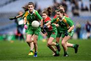 23 October 2019; Holly Garry of St Raphaela's PS, Stillorgan, in action against Aoife McDermott, left, and Tara Kelly of Our Lady Queen of the Apostles NS, Clonburris, in the Corn na Chladaigh Shield Final during day two of the Allianz Cumann na mBunscol Finals at Croke Park in Dublin. Photo by Piaras Ó Mídheach/Sportsfile