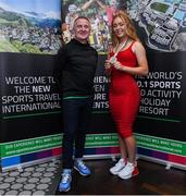 24 October 2019; From small beginnings to a big future. A celebration to the future of Sports Travel International. Chris Bird, CEO of Sports Travel International, left, with Track Cyclist and Irish Youth Olympian Lara Gillespie, from Co. Wicklow, at the Sports Travel International launch celebration at the Conrad Hotel in Dublin. Photo by Matt Browne/Sportsfile