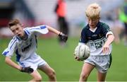 23 October 2019; Toby Devlin of St Pius X BNS, Terenure, in action against Max Carter of Ballyroan BNS in the Corn Kitterick Shield Final during day two of the Allianz Cumann na mBunscol Finals at Croke Park in Dublin. Photo by Piaras Ó Mídheach/Sportsfile