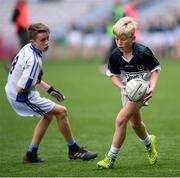 23 October 2019; Toby Devlin of St Pius X BNS, Terenure, in action against Max Carter of Ballyroan BNS in the Corn Kitterick Shield Final during day two of the Allianz Cumann na mBunscol Finals at Croke Park in Dublin. Photo by Piaras Ó Mídheach/Sportsfile