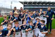 23 October 2019; St Pius X BNS, Terenure, players celebrate with the cup after beating Ballyroan BNS in the Corn Kitterick Shield Final during day two of the Allianz Cumann na mBunscol Finals at Croke Park in Dublin. Photo by Piaras Ó Mídheach/Sportsfile