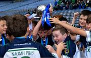 23 October 2019; Oisín Costello of St Pius X BNS, Terenure, and his team-mates celebrate with the cup after beating Ballyroan BNS in the Corn Kitterick Shield Final during day two of the Allianz Cumann na mBunscol Finals at Croke Park in Dublin. Photo by Piaras Ó Mídheach/Sportsfile