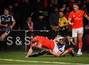 25 October 2019; James Cronin of Munster goes over to score his side's first try despite the tackle by Olly Cracknell of Ospreys during the Guinness PRO14 Round 4 match between Munster and Ospreys at Irish Independent Park in Cork. Photo by Sam Barnes/Sportsfile