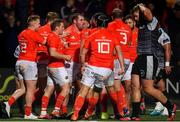 25 October 2019; James Cronin of Munster, centre, celebrates after scoring his side's first try with team-mates during the Guinness PRO14 Round 4 match between Munster and Ospreys at Irish Independent Park in Cork. Photo by Sam Barnes/Sportsfile