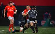 25 October 2019; Dan Goggin of Munster is tackled by Cai Evans, right, and Olly Cracknell of Ospreys during the Guinness PRO14 Round 4 match between Munster and Ospreys at Irish Independent Park in Cork. Photo by Sam Barnes/Sportsfile