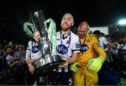 25 October 2019; Chris Shields of Dundalk with the SSE Airtricity League Premier Division trophy following the SSE Airtricity League Premier Division match between Dundalk and St Patrick's Athletic at Oriel Park in Dundalk, Co Louth. Photo by Stephen McCarthy/Sportsfile