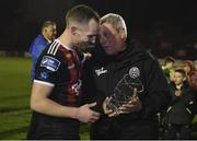 25 October 2019; Bohemians manager Keith Long presents Derek Pender with an award following the SSE Airtricity League Premier Division match between Bohemians and Sligo Rovers at Dalymount Park in Dublin. Photo by Harry Murphy/Sportsfile