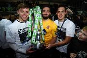 25 October 2019; Dundalk players, from left, Dylan Hand, Ross Treacy and Jamie McGrath with the SSE Airtricity League Premier Division trophy following the SSE Airtricity League Premier Division match between Dundalk and St Patrick's Athletic at Oriel Park in Dundalk, Co Louth. Photo by Stephen McCarthy/Sportsfile