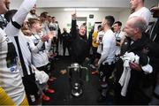 25 October 2019; Dundalk first team coach John Gill and players celebrate with the trophy following the SSE Airtricity League Premier Division match between Dundalk and St Patrick's Athletic at Oriel Park in Dundalk, Co Louth. Photo by Stephen McCarthy/Sportsfile