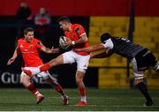 25 October 2019; Shane Daly of Munster is tackled by Lloyd Ashley of Ospreys during the Guinness PRO14 Round 4 match between Munster and Ospreys at Irish Independent Park in Cork. Photo by Sam Barnes/Sportsfile