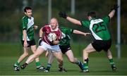 26 October 2019; John Gill of Kennagh GAA in action against Berlin GAA players, from left, Arthur O'Sullivan, Conor O'Brien and Tomás O Dúláinne during the AIB Leinster Club Junior Football Championship Round 1 match between Berlin GAA and Kenagh GAA at GAA Centre of Excellence at Abbottstown, Dublin. Photo by David Fitzgerald/Sportsfile
