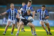 26 October 2019; Diarmuid McLoughlin of St Judes in action against Ballyboden St Endas players, from left, Darren O'Reilly, Rob McDaid and Bob Dwan during the Dublin County Senior Club Football Championship semi-final match between  Ballyboden St Endas and St Judes at Parnell Park, Dublin. Photo by David Fitzgerald/Sportsfile