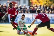 26 October 2019; Chris Cargo of Ireland scores his side's first goal despite the efforts of Gordon Johnston, 16, and Sukhi Panesar of Canada during the FIH Men's Olympic Qualifier match between Canada and Ireland at Rutledge Field, in West Vancouver, British Columbia, Canada. Photo by Darryl Dyck/Sportsfile