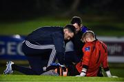 18 October 2019; Conor Kearns of UCD receives medical attention during the SSE Airtricity League Premier Division match between UCD and Shamrock Rovers at The UCD Bowl in Belfield, Dublin. Photo by Ben McShane/Sportsfile