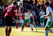 26 October 2019; Matthew Nelson of Ireland  in action against Gordon Johnston of Canada during the FIH Men's Olympic Qualifier match at Rutledge Field, in West Vancouver, British Columbia, Canada. Photo by Darryl Dyck/Sportsfile