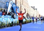 27 October 2019; Joseph Fowler from Dublin crosses the finish line in today’s 2019 KBC Dublin Marathon. 22,500 runners took to the Fitzwilliam Square start line today to participate in the 40th running of the KBC Dublin Marathon, making it the fifth largest marathon in Europe. Photo by Sam Barnes/Sportsfile