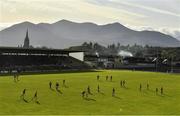 27 October 2019; David Clifford of East Kerry kicks a point despite the best efforts of Trevor Wallace of St Brendan's during the Kerry County Senior Club Football Championship semi-final match between St Brendan's and East Kerry at Fitzgerald Stadium in Killarney, Kerry. Photo by Brendan Moran/Sportsfile