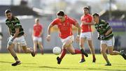 27 October 2019; Paudie Clifford of East Kerry solos away from Trevor Wallace, left, and Thomas Kerins of St Brendan's during the Kerry County Senior Club Football Championship semi-final match between St Brendan's and East Kerry at Fitzgerald Stadium in Killarney, Kerry. Photo by Brendan Moran/Sportsfile