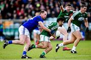 27 October 2019; Naoise O'Baoill of Gaoth Dobhair in action against Anthony Thompson of Naomh Conaill during the Donegal County Senior Club Football Championship Final Replay match between Gaoth Dobhair and Naomh Conaill at Mac Cumhaill Park in Ballybofey, Donegal. Photo by Oliver McVeigh/Sportsfile