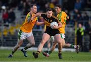 27 October 2019; Daithi Casey of Dr. Crokes is tackled by Mark Griffin of South Kerry during the Kerry County Senior Club Football Championship semi-final match between South Kerry and Dr Crokes at Fitzgerald Stadium in Killarney, Kerry. Photo by Brendan Moran/Sportsfile