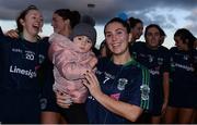 27 October 2019; Lorna Fusciardi of Foxrock-Cabinteely with her daughter Harlie following the Leinster Ladies Football Senior Club Championship Final match between Foxrock-Cabinteely and Sarsfields at Coralstown-Kinnegad GAA in Kinnegad, Co. Westmeath. Photo by Ben McShane/Sportsfile