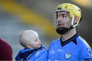 27 October 2019; Aaron Craig of St Anne's and his 10-month-old son Oisin during the pre-match parade prior to the Wexford County Senior Club Hurling Championship Final between St Martin's and St Anne's at Innovate Wexford Park in Wexford. Photo by Stephen McCarthy/Sportsfile
