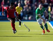 27 October 2019; Eugene Magee of Ireland, right, is pursued by Sukhi Panesar of Canada during the first half of the FIH Men's Olympic Qualifier match at Rutledge Field, in West Vancouver, British Columbia, Canada. Photo by Darryl Dyck/Sportsfile