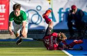 27 October 2019; Sean Murray of Ireland, centre, collides with James Kirkpatrick of Canada during the second half of the FIH Men's Olympic Qualifier match at Rutledge Field, in West Vancouver, British Columbia, Canada. Photo by Darryl Dyck/Sportsfile