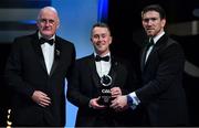 1 November 2019; Armagh hurler Simon Doherty is presented with his Champion 15 award by Uachtarán Cumann Lúthchleas Gael John Horan, left, and GPA Chairman Seamus Hickey during the PwC All-Stars 2019 at the Convention Centre in Dublin. Photo by Brendan Moran/Sportsfile