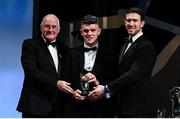 1 November 2019; Meath hurler Jack Regan is presented with his Christy Ring Cup Player of the Year award by Uachtarán Cumann Lúthchleas Gael John Horan and GPA Chairman Seamus Hickey during the PwC All-Stars 2019 at the Convention Centre in Dublin. Photo by Brendan Moran/Sportsfile